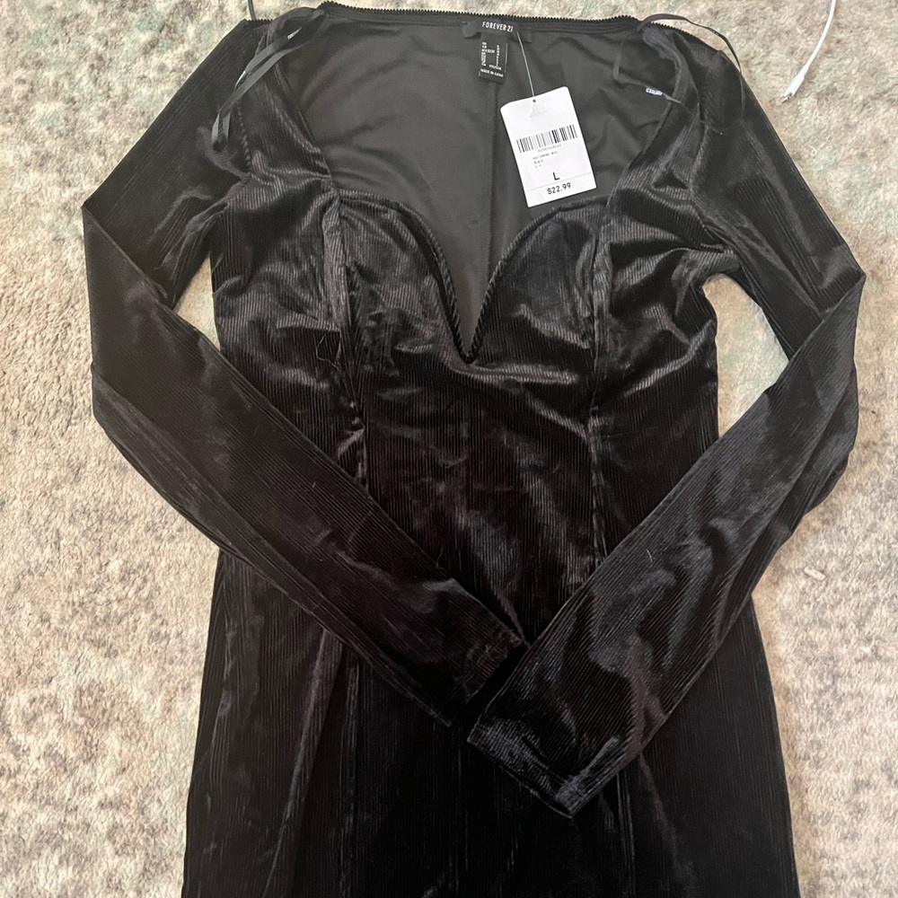 F21 bodycon dress in black with wired neckline